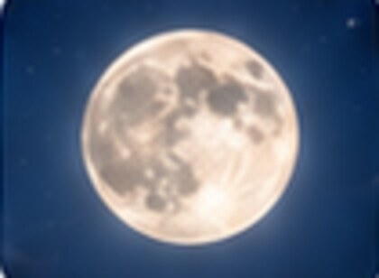 Full moon against a deep blue night sky, paired with the word luna